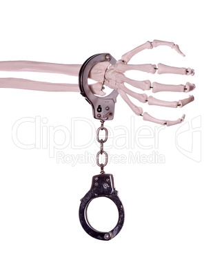 handcuff and skeleton hand