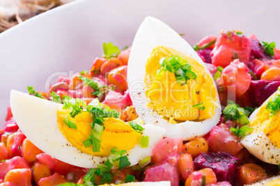 Red beet salad with egg