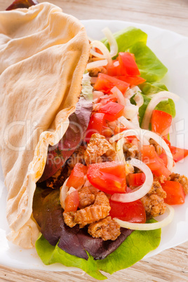 Kebab - grilled meat, bread and vegetables