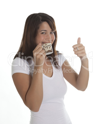 woman enjoys a cup of espresso