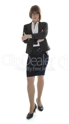 young businesswoman standing with arms crossed on white