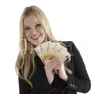 confident young businesswoman holding currency notes and smiling