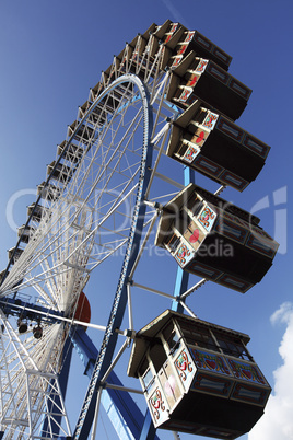 the high ferry wheel at the oktoberfest in munich