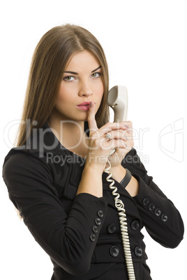 successful businesswoman gesturing keep silence