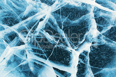 Beautiful ice of Lake Baikal with abstract cracks