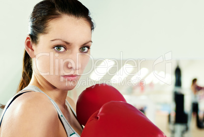 Boxer woman during boxing exercise