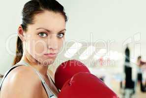 Boxer woman during boxing exercise