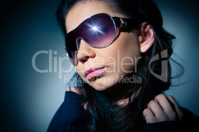 Portrait of a young girl in sunglasses