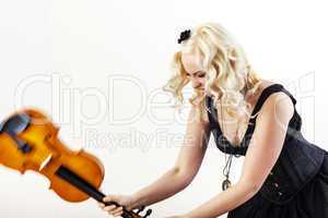 Woman smashed her violin with rage