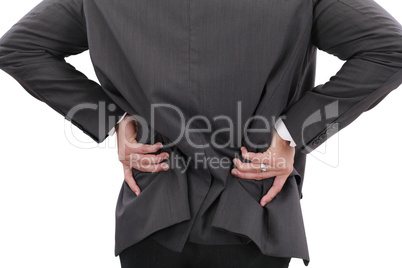 Young businessman having some lower back pain