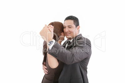 young couple dancing over white background