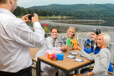 Woman posing for camera at restaurant outdoors