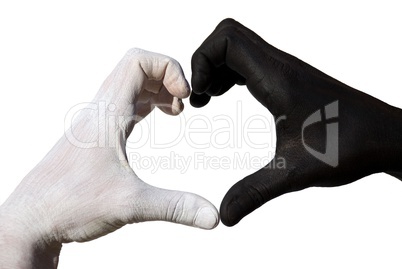 Heart formed by black and white hand