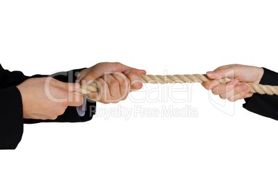 tug of war; hands pulling a rope; business background