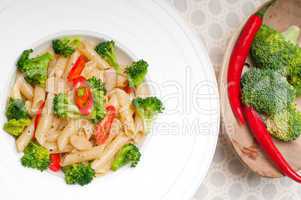 Italian penne pasta with broccoli and chili pepper