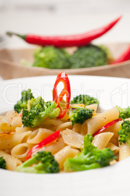 Italian penne pasta with broccoli and chili pepper