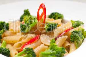 Italian penne pasta with broccoli and chili pepper