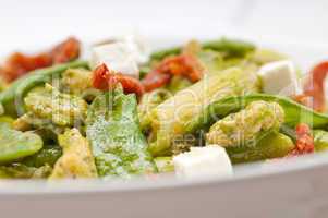 Italian penne pasta with sundried tomato and basil