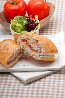 ciabatta panini sandwich with parma ham and tomato