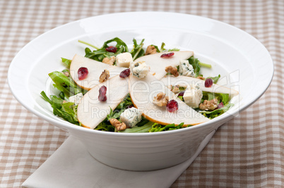 Fresh pears arugula gorgonzola cheese salad