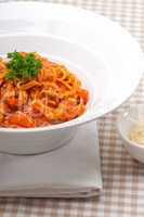 Italian spaghetti pasta with tomato and chicken