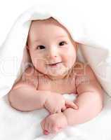 baby under white blanket