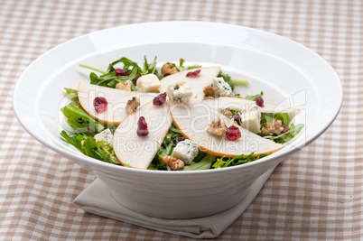 Fresh pears arugula gorgonzola cheese salad