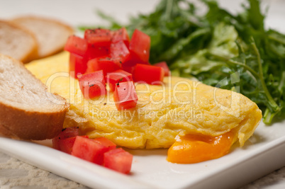 cheese ometette with tomato and salad