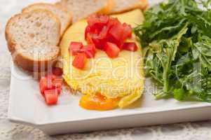 cheese ometette with tomato and salad