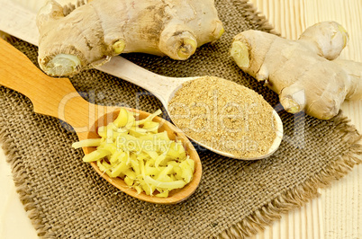 Ginger fresh and dried in wooden spoons