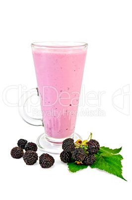 Milkshake in a tall glass with blackberry and leaf