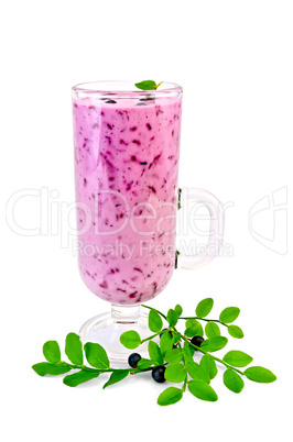 Milkshake with blueberries in a glass goblet