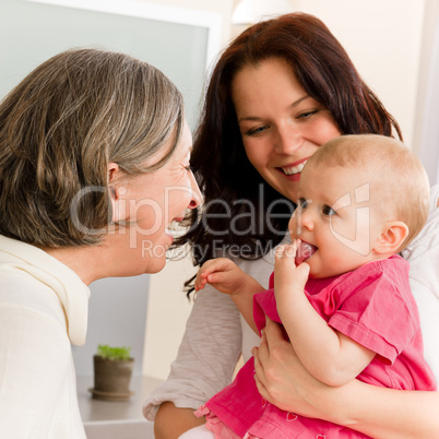 Happy family women - grandmother, mum and baby