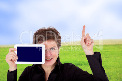 Woman holding tablet and raises a finger