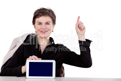 Woman holding tablet and raises a finger