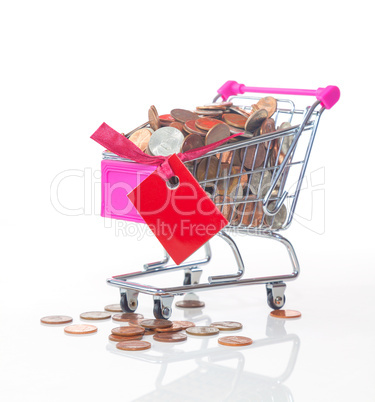 Shopping cart full with coins