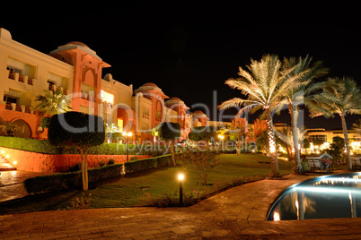 The swimming pool at luxury hotel in night illumination, Hurghad