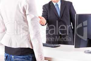Businessman and Businesswoman in office