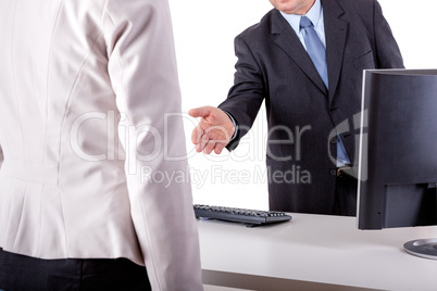 Businessman and Businesswoman in office