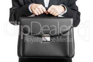 businessman hand holding briefcase