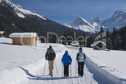 Family Hiking on a snowy Trail