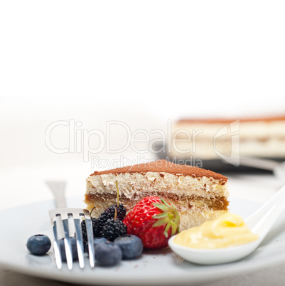 tiramisu dessert with berries and cream