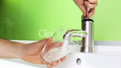 Pouring Water into Glass