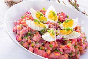 Red beet salad with egg