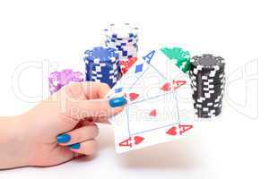 Hand with two Aces and Stacks Poker Chips