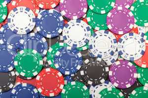 Background from of Multicolored Poker Chips