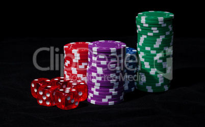 Stacks of Poker Chips with Playing Bones