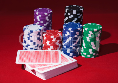 Stacks of Poker Chips with Playing Cards