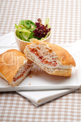 ciabatta panini sandwich with parma ham and tomato