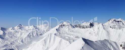 Panorama of snow mountains and blue sky
